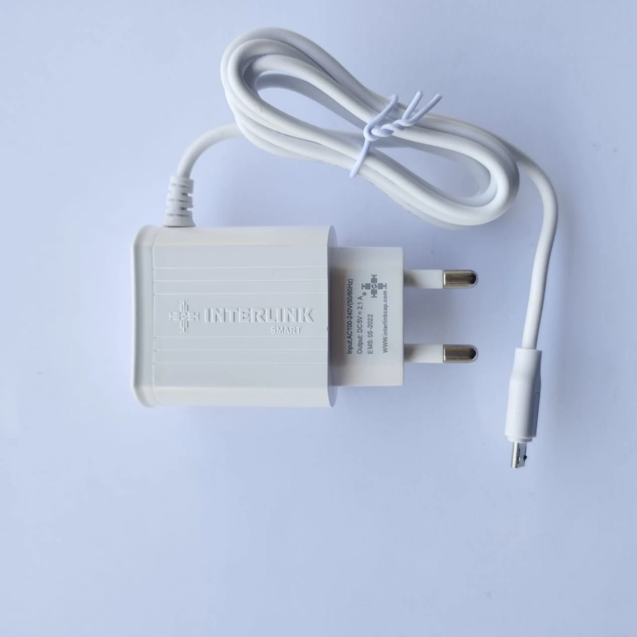 Interlink smart Usb Mobile charger  2 USB Outputs  2.1 A charger  3 in 1 rapid charging with fixed cable price in Pakistan