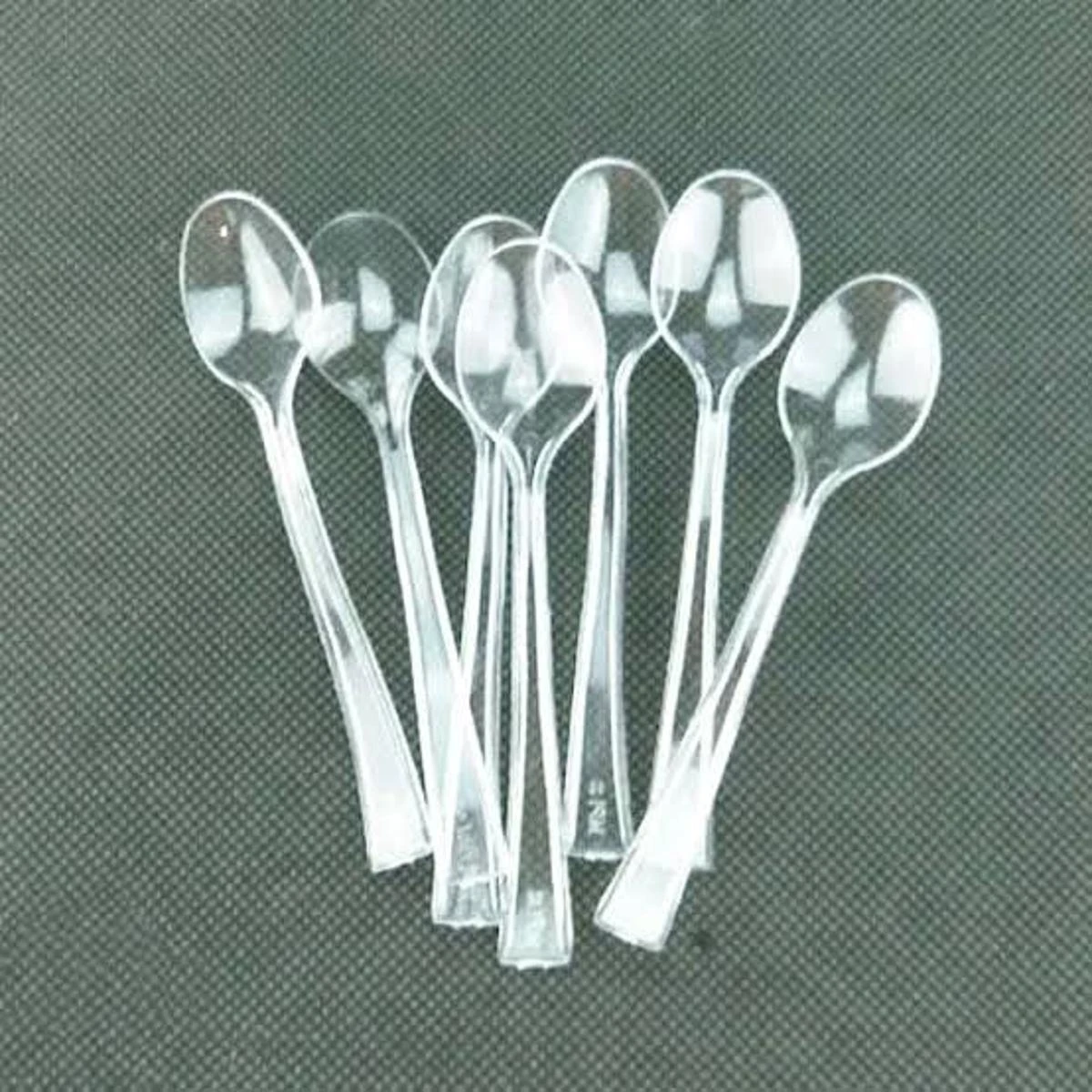 Disposable Ice cream spoons transparent pack of 50100200300 pcs price in Pakistan